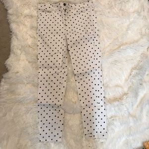 Black and white polka dotted pants.